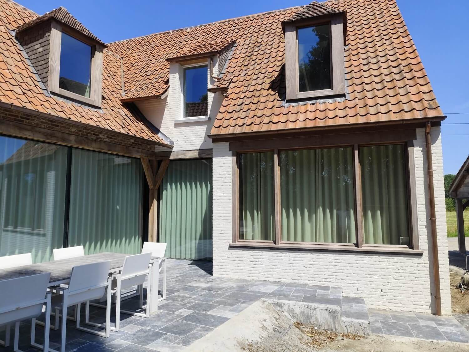 Gevelrenovatie van een hoeve met Rewah